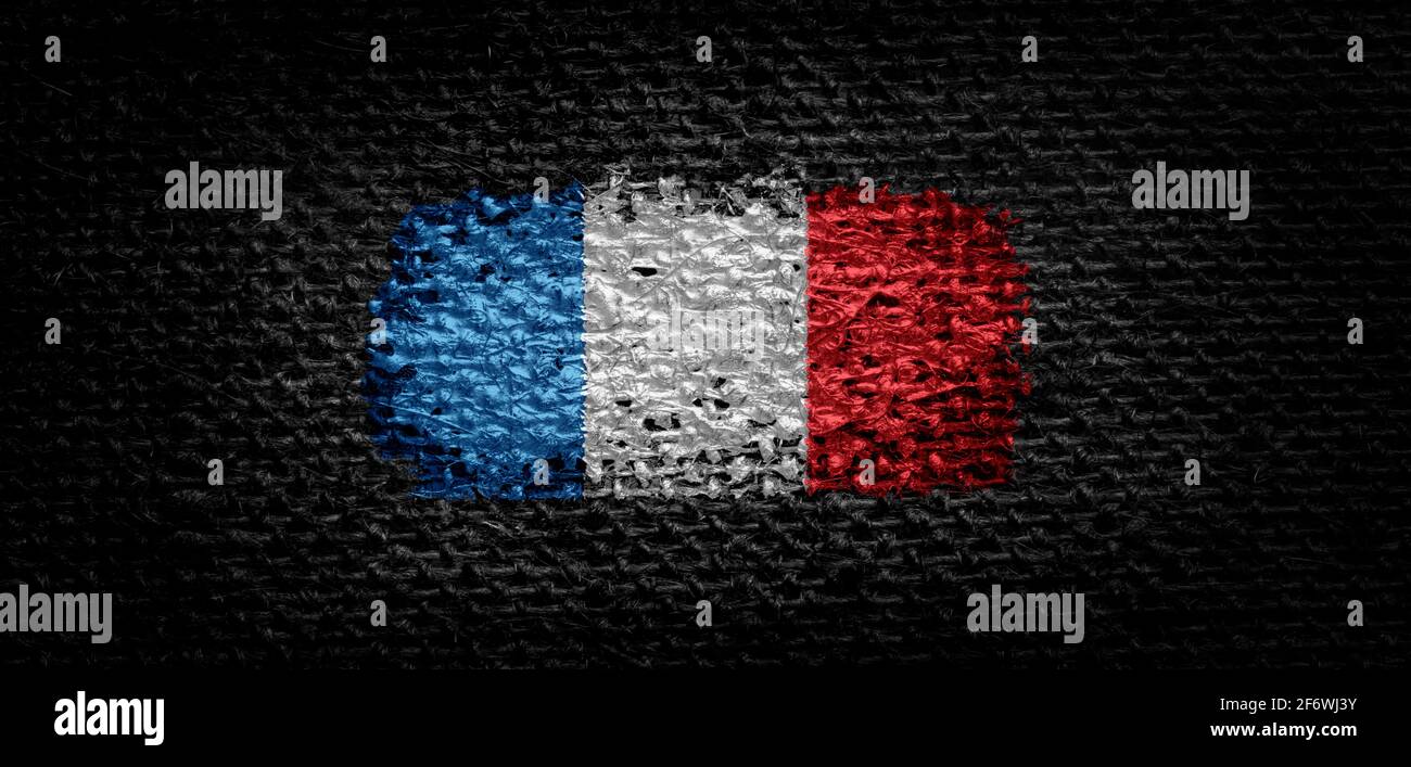 National flag of the France on dark fabric Stock Photo - Alamy