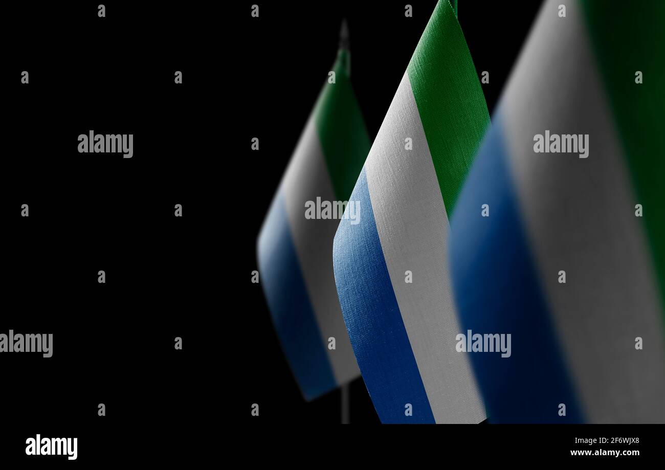 Small national flags of the Sierra Leone on a black background Stock ...