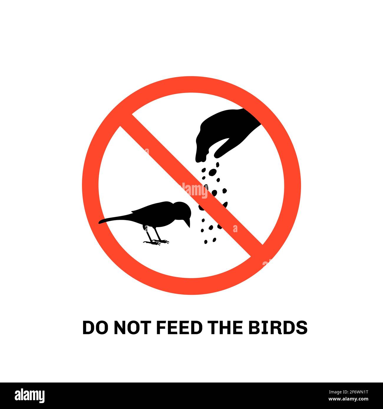 Prohibition sign with text do not feed the birds and hand silhouette