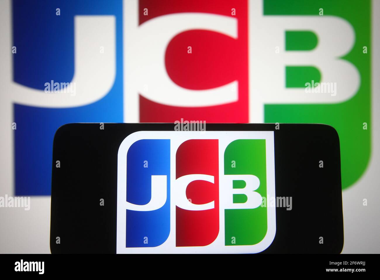 Ukraine. 02nd Apr, 2021. In this photo illustration a JCB logo of an Japanese credit card company is seen on a smartphone and a pc screen. (Photo by Pavlo Gonchar/SOPA Images/Sipa USA) Credit: Sipa USA/Alamy Live News Stock Photo