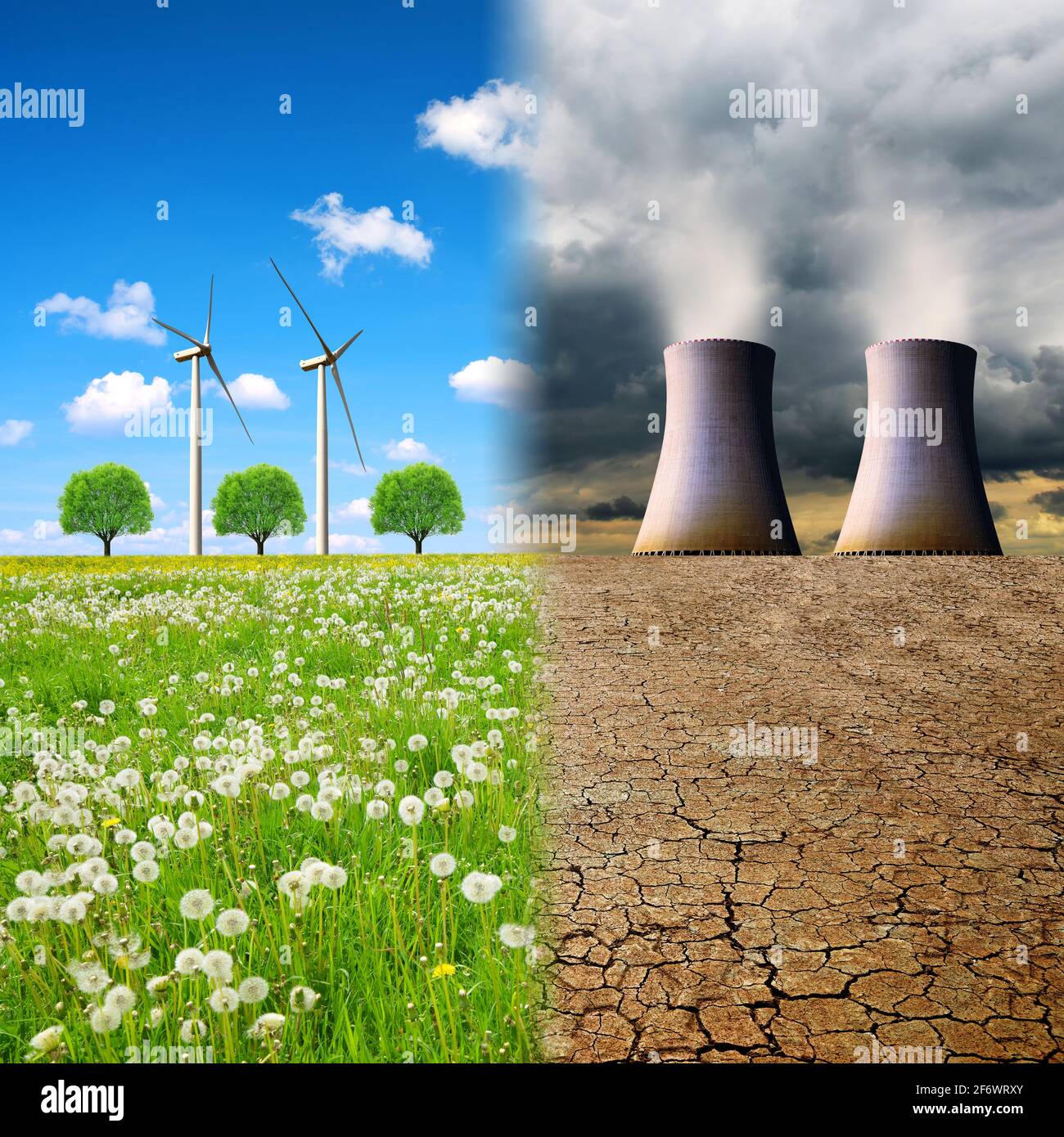 Cooling towers of a nuclear power plant in a devastated landscape and wind turbines on a meadow. Concept of clean and polluting energy generation. Stock Photo