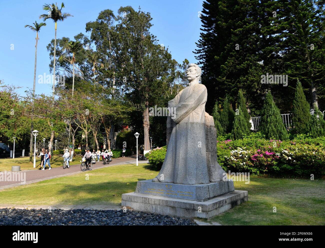 Xiamen. 26th Mar, 2021. Photo taken on March 26, 2021 shows the sculpture of Lu Xun, one of the most famous contemporary Chinese writers, at the Xiamen University in Xiamen, southeast China's Fujian Province. Xiamen University, based in China's southeastern city of Xiamen, was founded by Tan Kah Kee in 1921, making it the first Chinese university founded by an overseas Chinese national. This year, Xiamen University greets its 100th birthday anniversary. Credit: Wei Peiquan/Xinhua/Alamy Live News Stock Photo