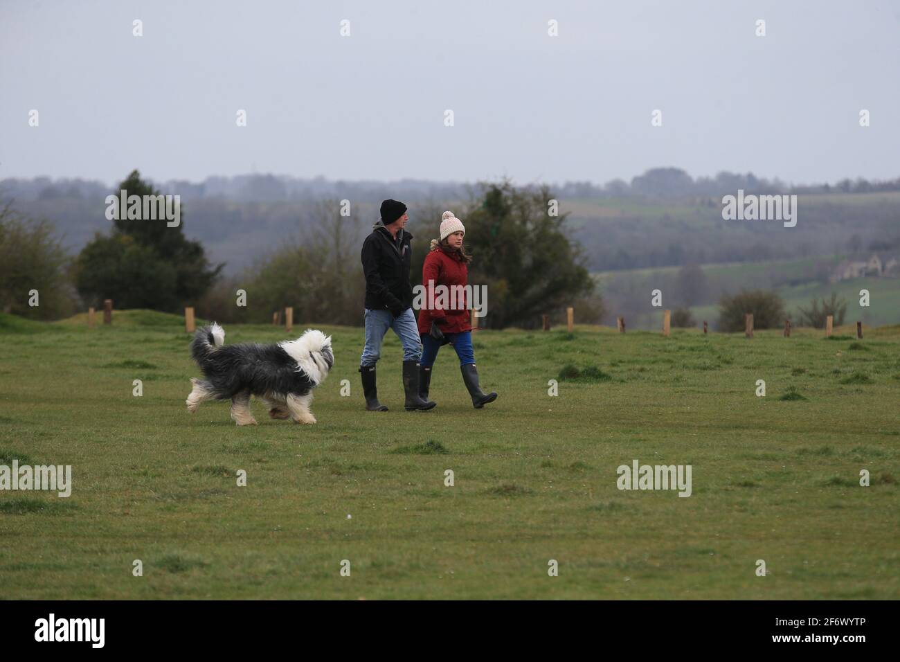 Stroud, UK, 3rd April, 2021. UK Weather. Overcast skies with chilly winds as the walkers on Rodborough Common wrap up after warm temperatures earlier in the week. Gloucestershire. UK. Stock Photo