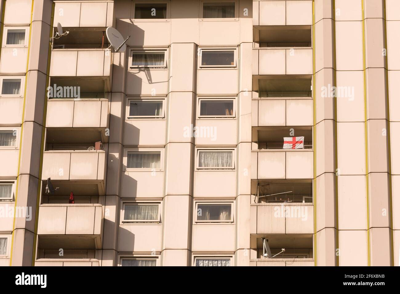 George Cross flag hanging from one of the Towers blocks, Ampthill Square Estate, the estate was re-clad in the 1980s. Its cladding was found in 2017 t Stock Photo
