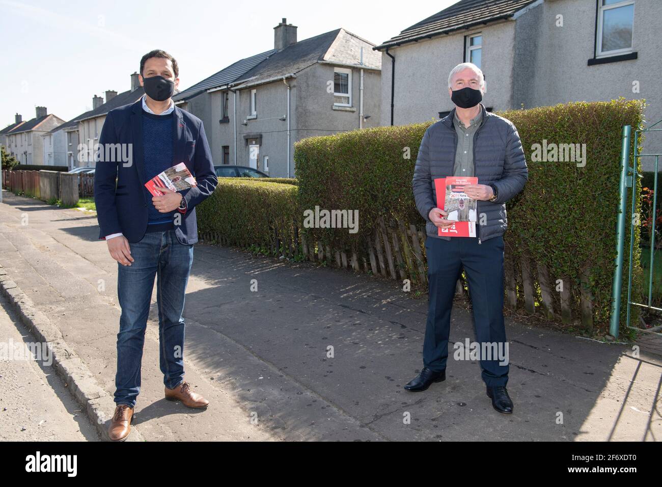 Glasgow, Scotland, UK. 3rd Apr, 2021. PICTURED: (left) Anas Sarwar MSP; (right) James Kelly MSP. Scottish Labour Leader, Anas Sarwar MSP joins James Kelly MSP on the campaign trail in Rutherglen. Credit: Colin Fisher/Alamy Live News Stock Photo