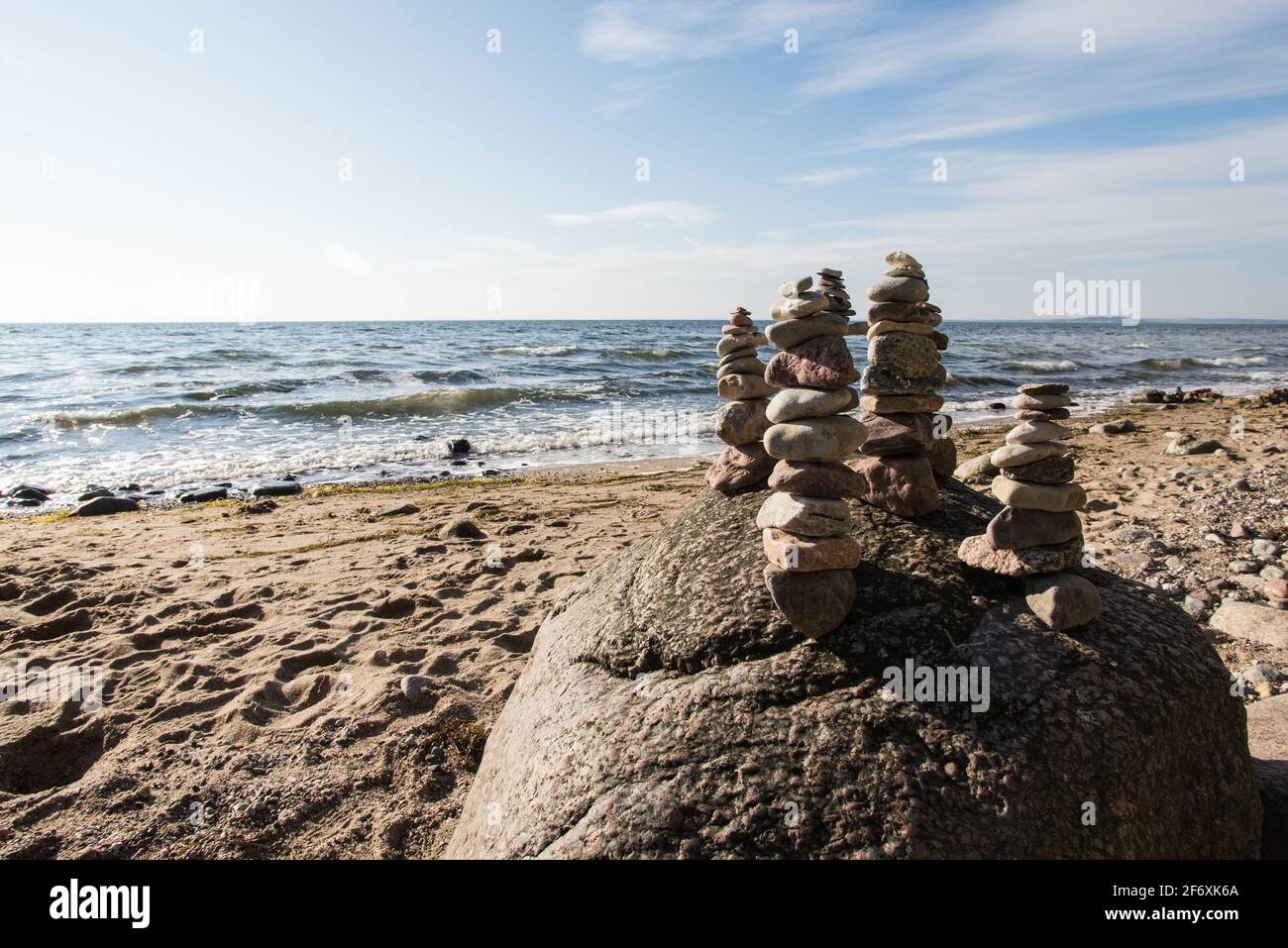 Stone piles at Nonnenloch beach in the Zicker hills of Ruegen Island