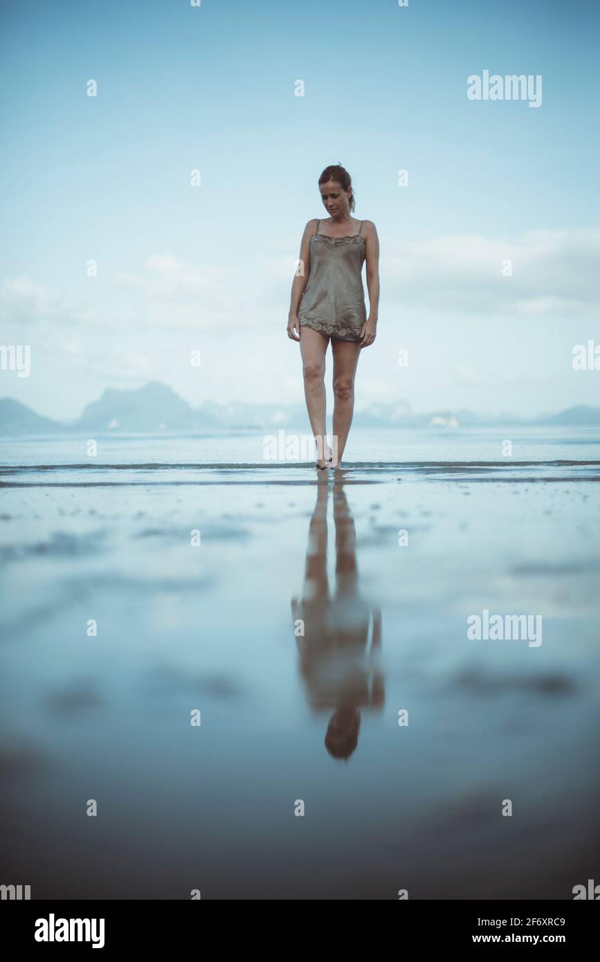 Woman walking on the beach, Koh Yao, Phang Nga, Thailand Stock Photo