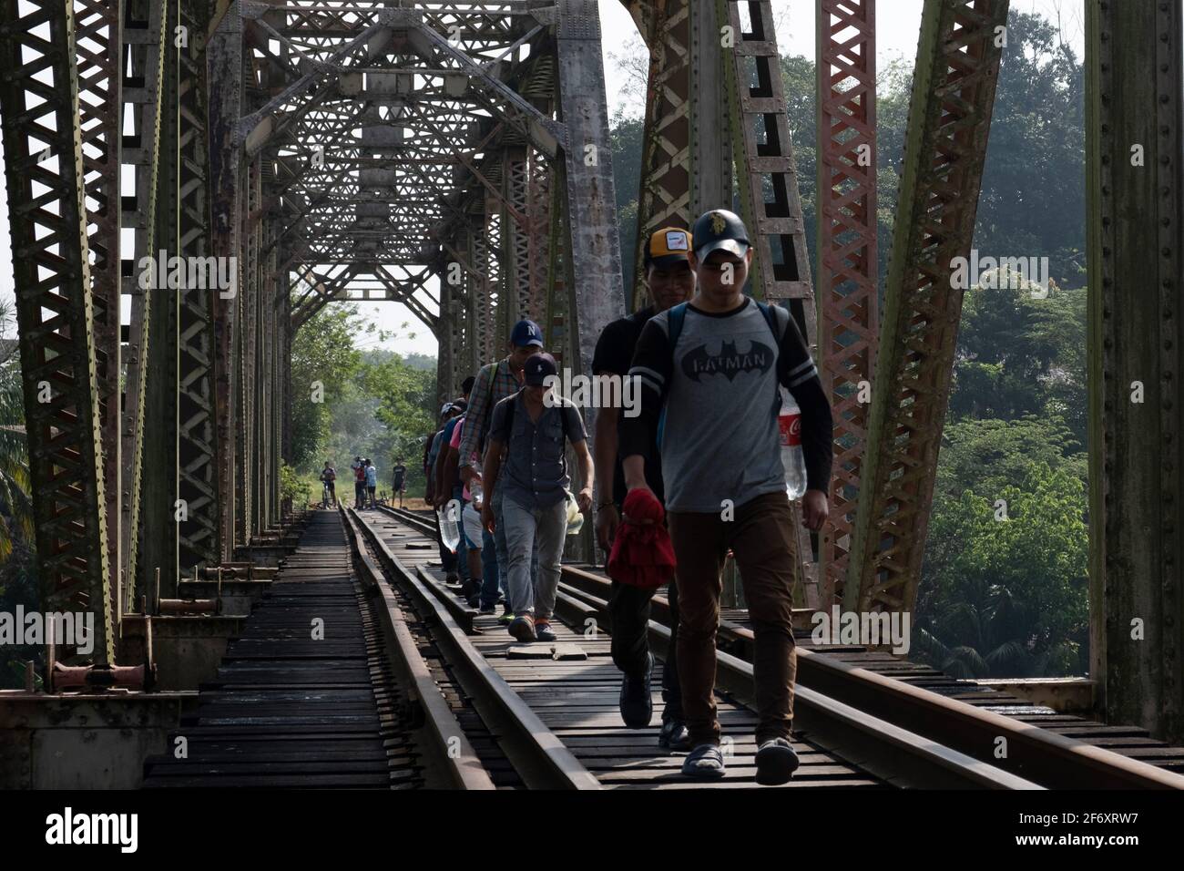 Huimanguillo, Mexico. 31st Mar, 2021. Hondurans Migrants, continue their journey on the railroad tracks, crossing Mezcalpa river in Tabasco to reach the U.S. border. looking for American dream. On March 31, 2021 Huimanguillo, Mexico. (Photo by Eyepix/Sipa USA) Credit: Sipa USA/Alamy Live News Stock Photo