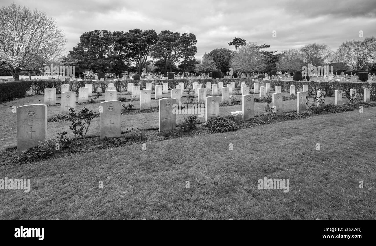 Commonwealth War Graves from first and second world wars in Littlehampton Cemetery in Littlehampton, West Sussex, England, UK. CWGC. B&W. Stock Photo