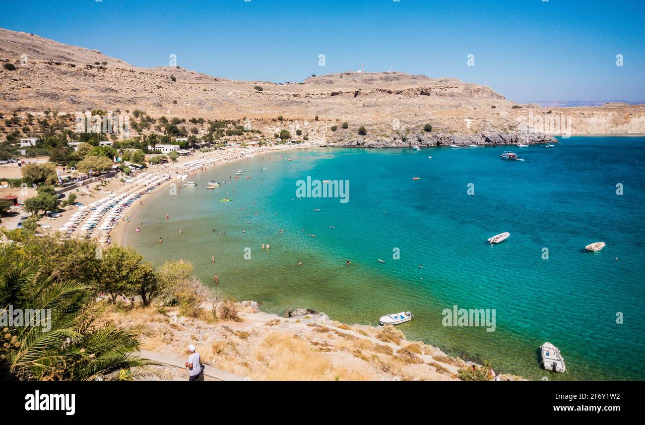 Lindos White Rodes Beautiful beach of Lindos, white Village in Rhodes, Greece. Bay with ...