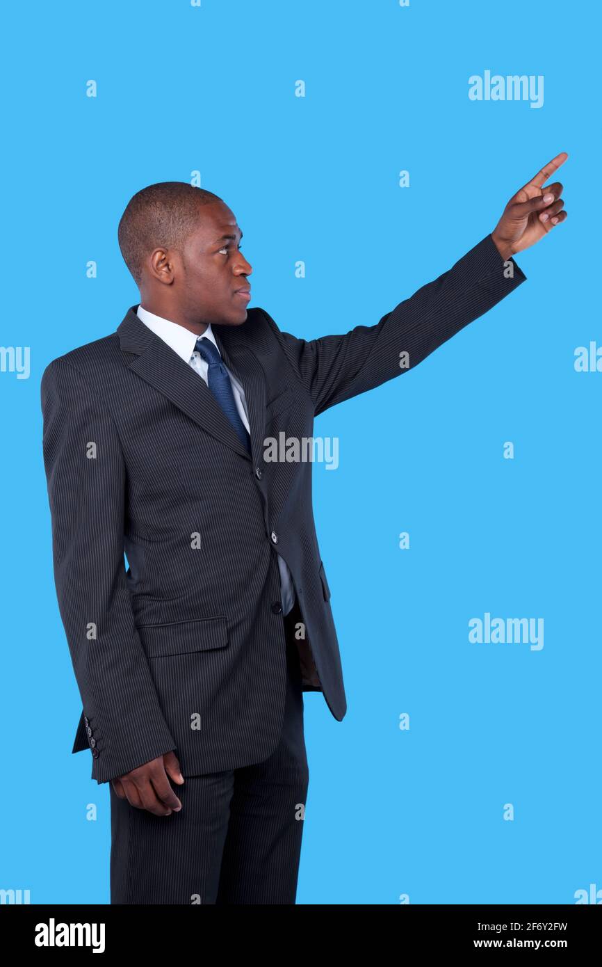 african businessman pointing to the copyspace Stock Photo