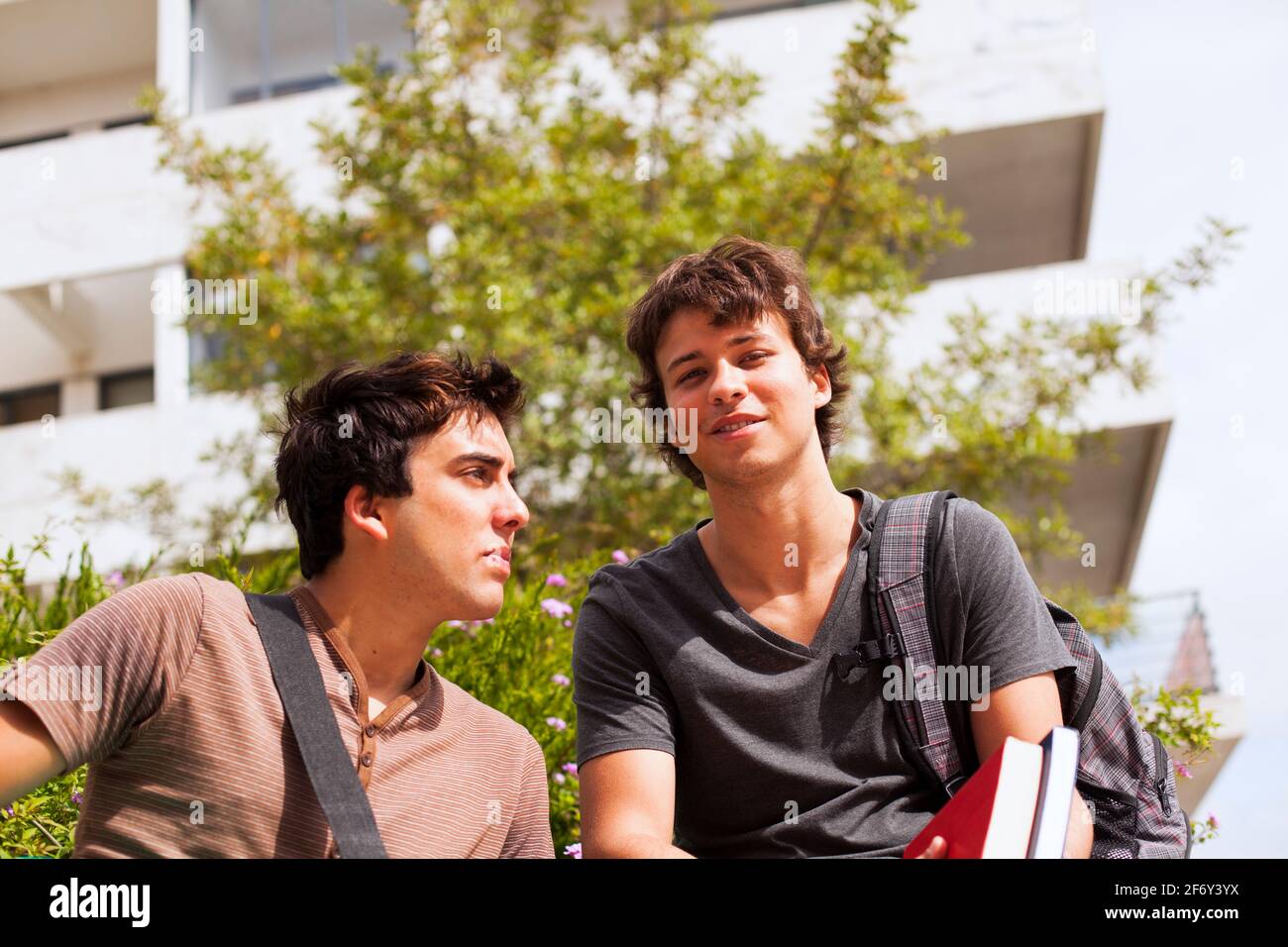 Two boys talking campus hi-res stock photography and images - Alamy