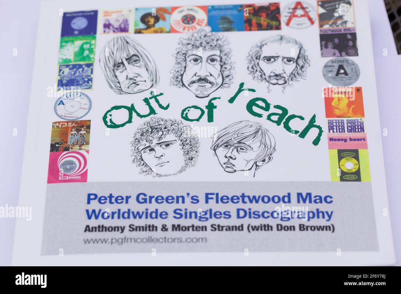 View of Out of Reach, Peter Green's Fleetwood Mac Worldwide Singles Discography book by Anthony Smith, Morten Strand on a white background Stock Photo
