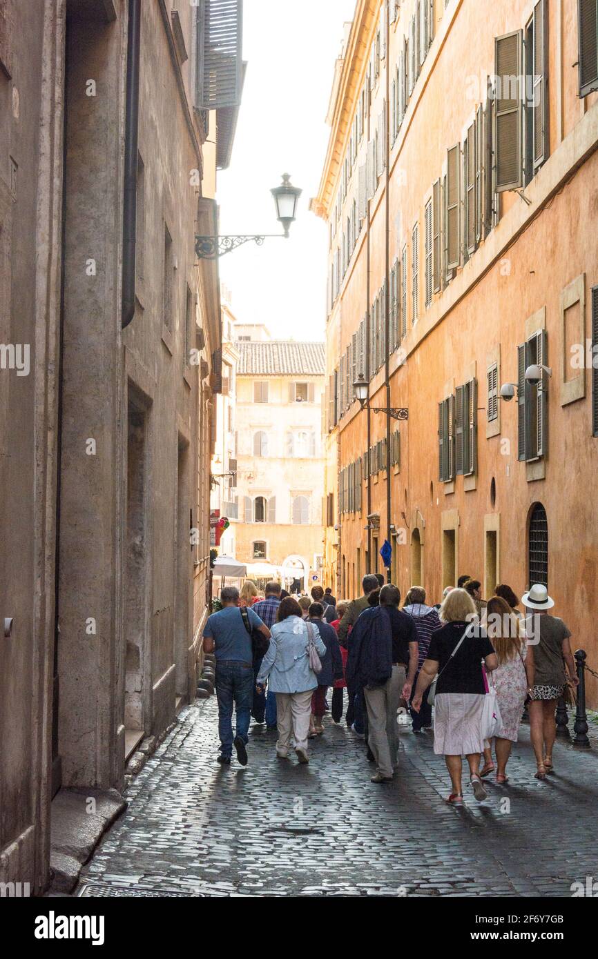 Rome, Italy - Oct 03, 2018: tourists walk on Via Giustiniani Stock Photo