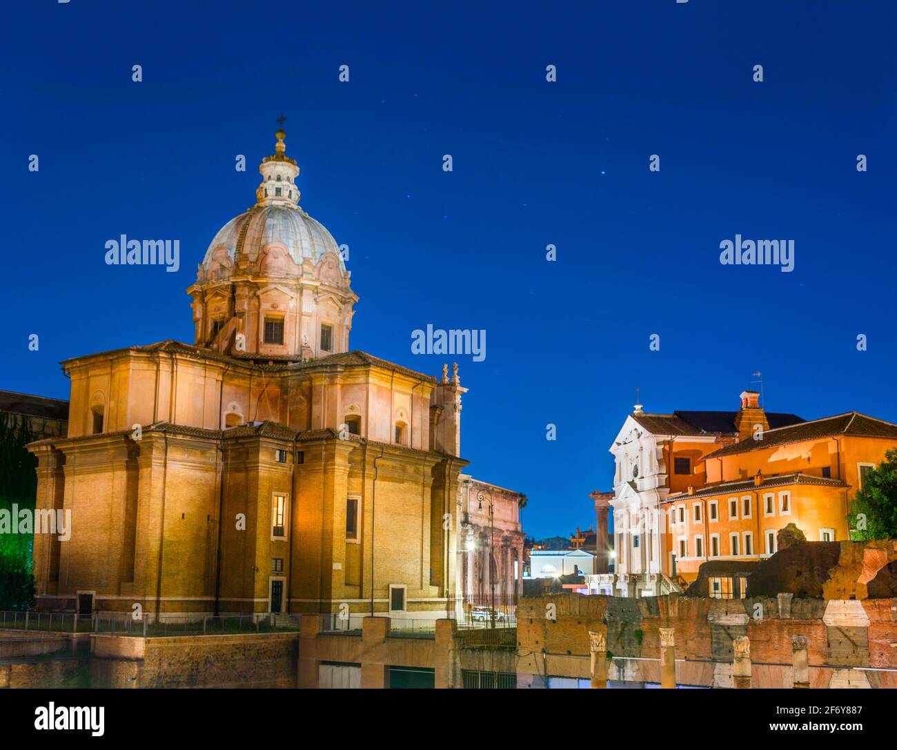 Rome, Italy - Oct 03, 2018: Night lights Chiesa dei Santi Luca e Martina and Carcere Mamertino in the center of Rome Stock Photo