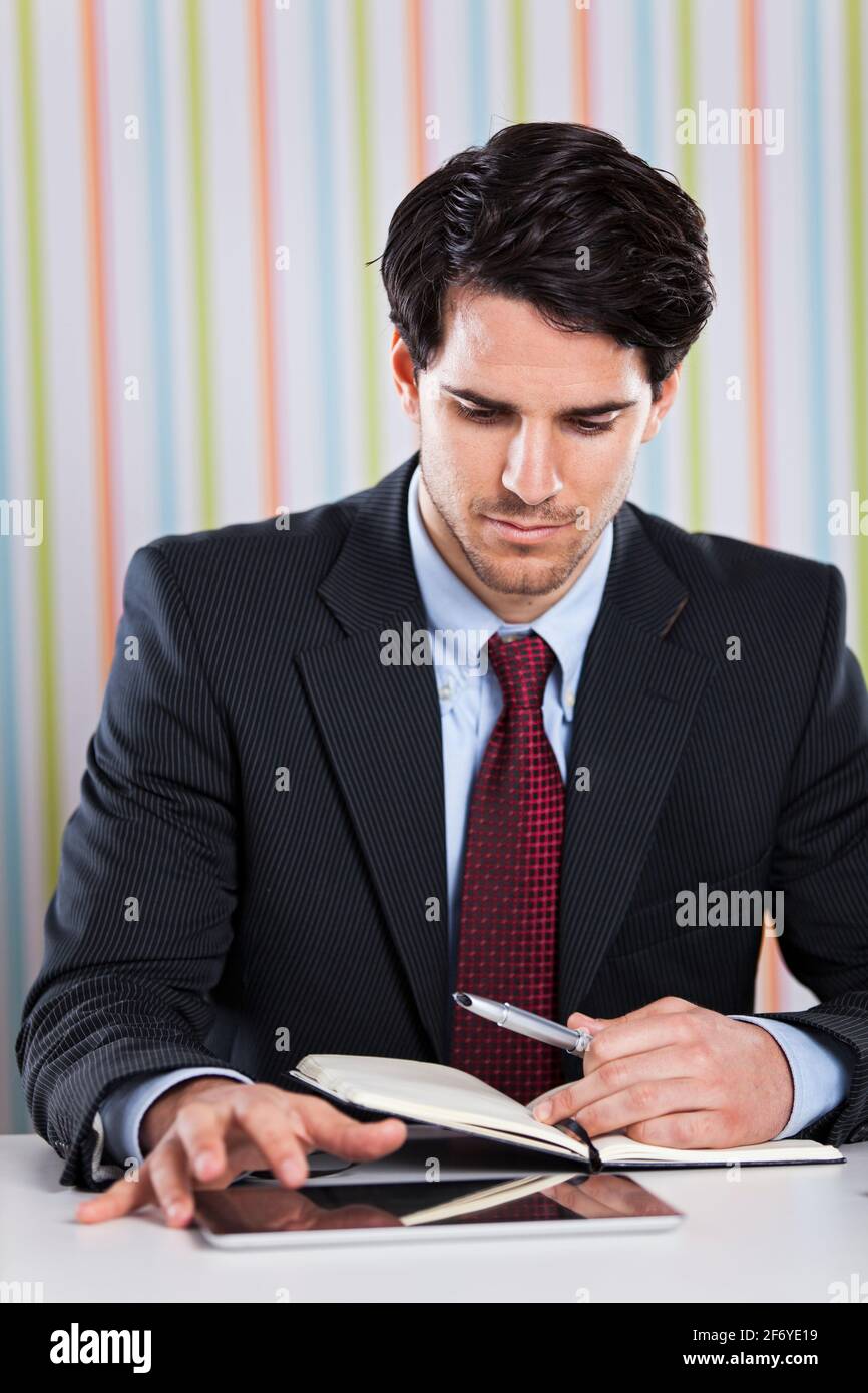 Businessman sitting desk making paper hi-res stock photography and ...