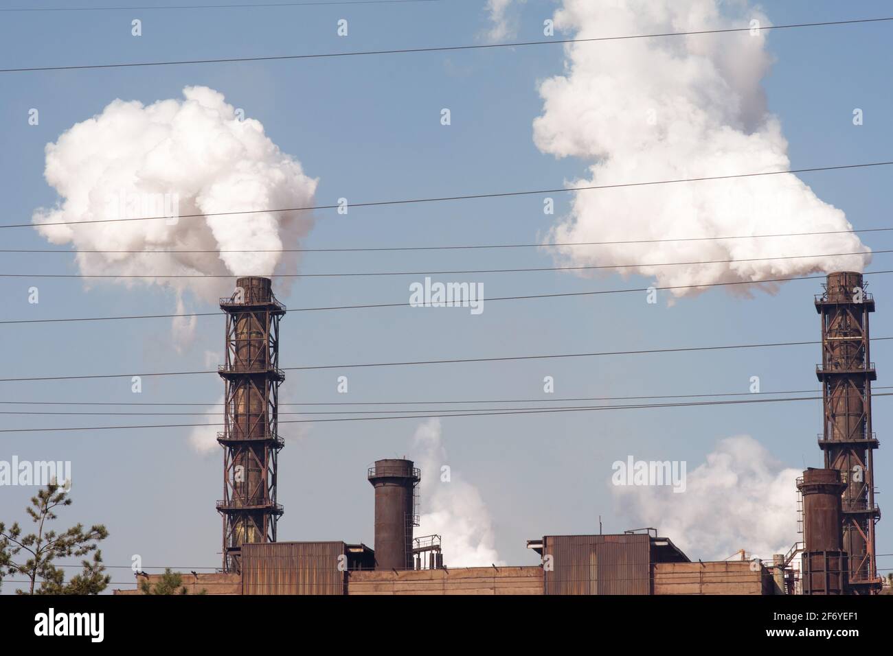 Air emissions polluting the city. Ecological pollution.  Stock Photo