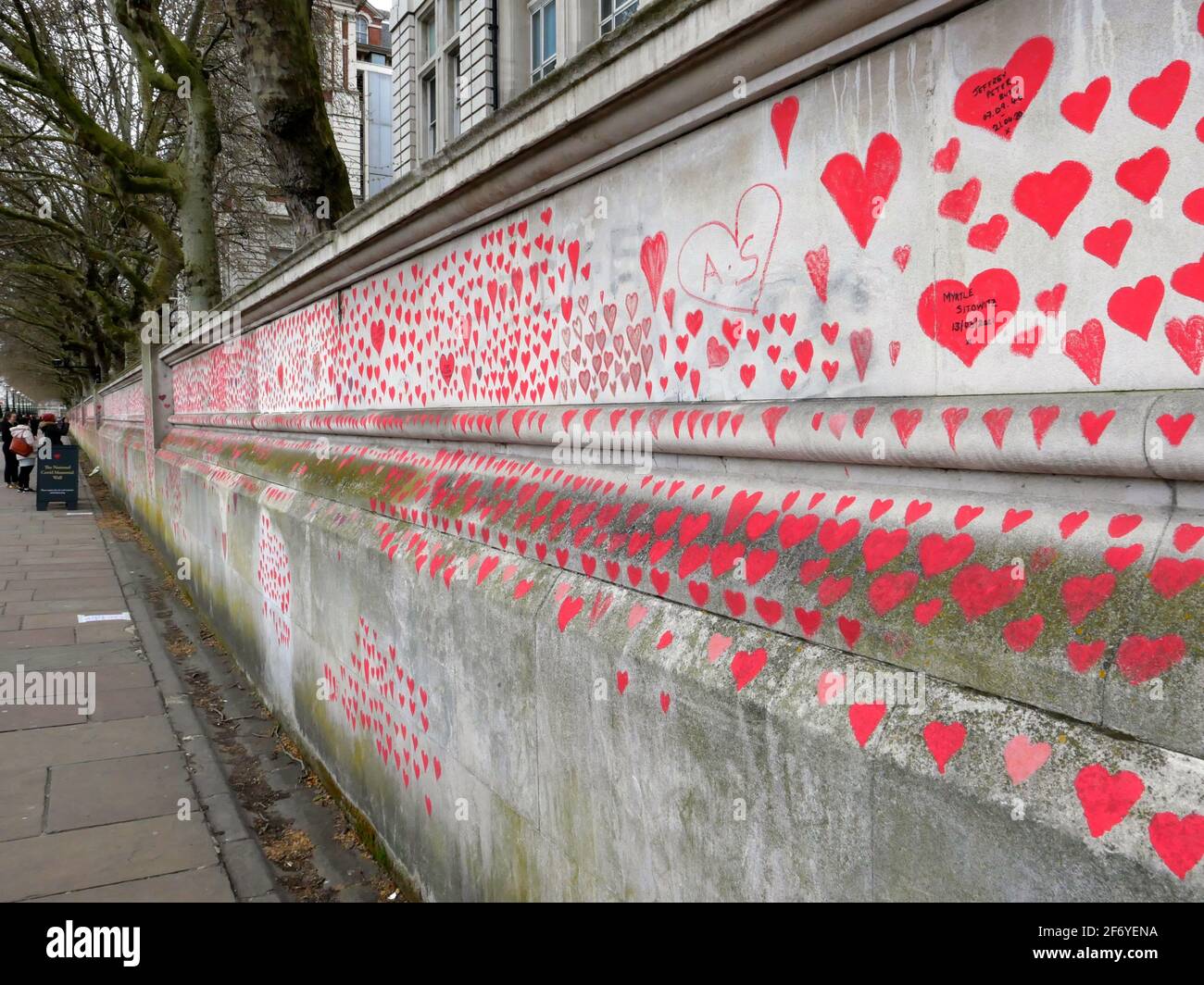 150000 hearts painted in London to represent lives lost to Covid 19 across the UK .Each heart represents someone who was loved and was lost too soon to Covid - 19 . Matt Fowler , co Founder said when they started painting the hearts .Labour leader Keir Starmer arrived and showed support . Hopefully the council will seal the hearts once they are finished so it can become a permanent memorial for those who lost there lives and hopefully a public enquiry can take place to investigate the failings of the Tory Government in order to learn lessons quickly and prevent further loss of life ... Stock Photo
