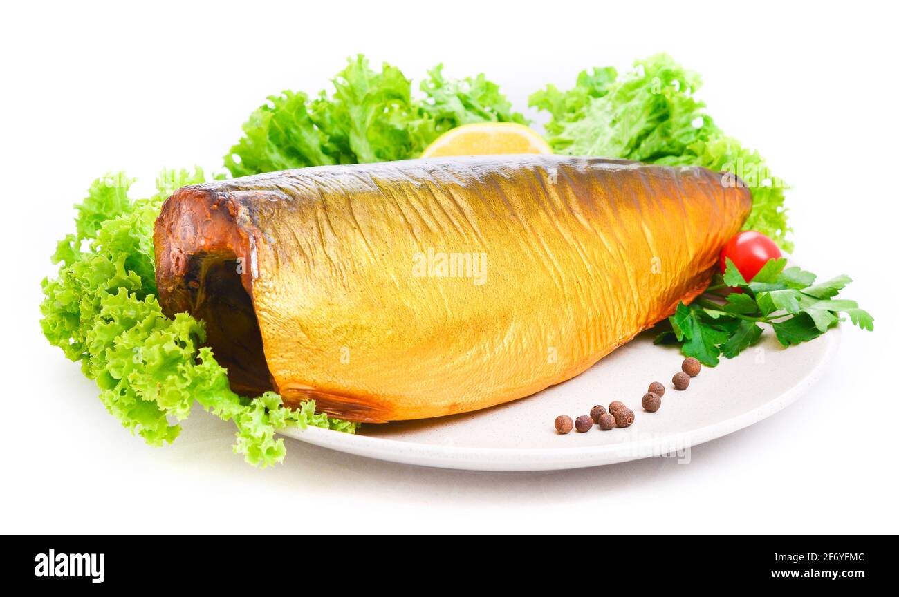 Appetizing smoked fish isolated on a platter Stock Photo