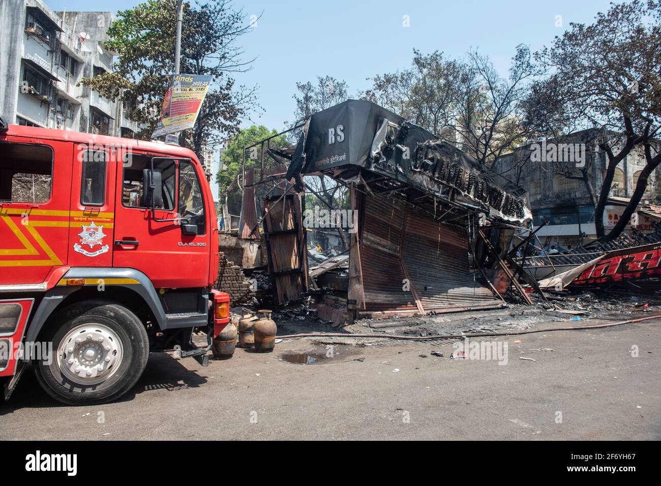 Mumbai , India - 30 March 2021, A view of the outside of a burned cloth store shop at Goregaon West market in Mumbai Maharashtra India Stock Photo