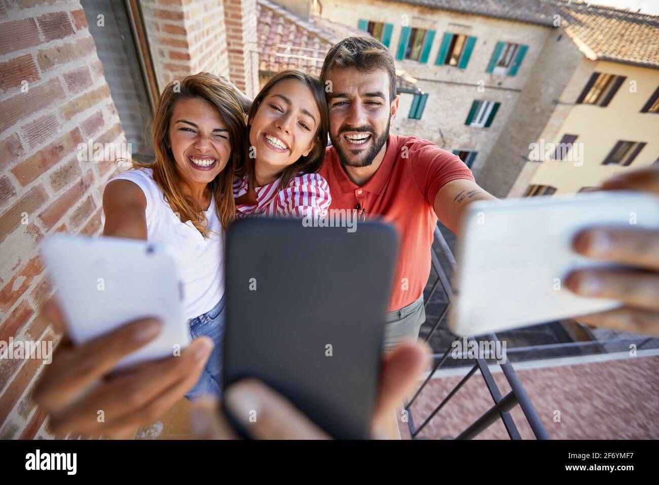 Group joyful students posing hi-res stock photography and images - Alamy