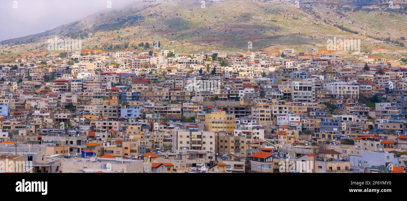 Majdal Shams Druze village houses on the slopes of Hermon mountain, Northern Israel. Stock Photo