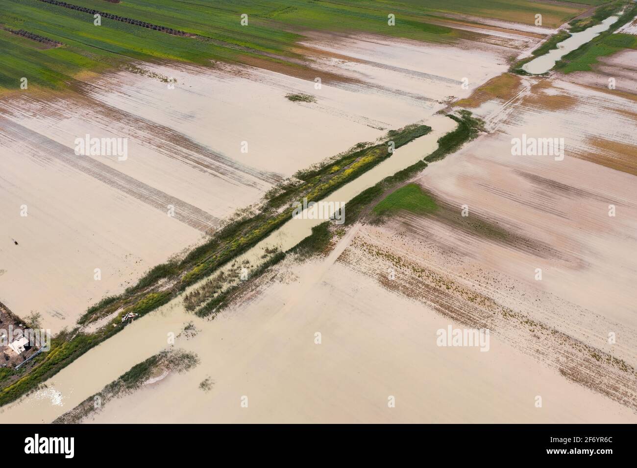 Flooded agricultural fields due to heavy rains, Aerial view. Stock Photo