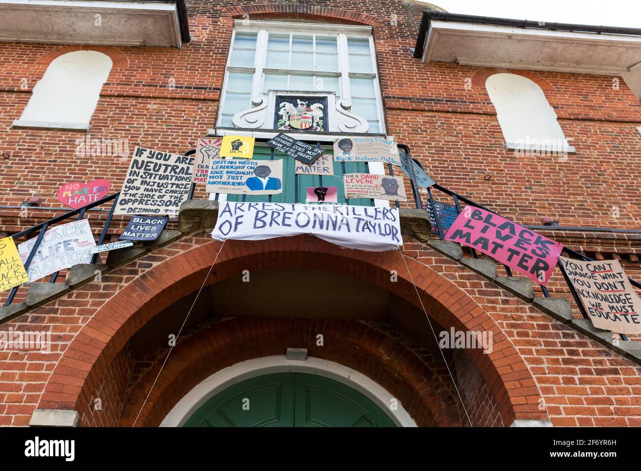 Woodbridge, Suffolk, UK June 20 2020: Homemade BLM protest signs that have been fixed to the town hall in the center of Woodbridge to show the town an Stock Photo