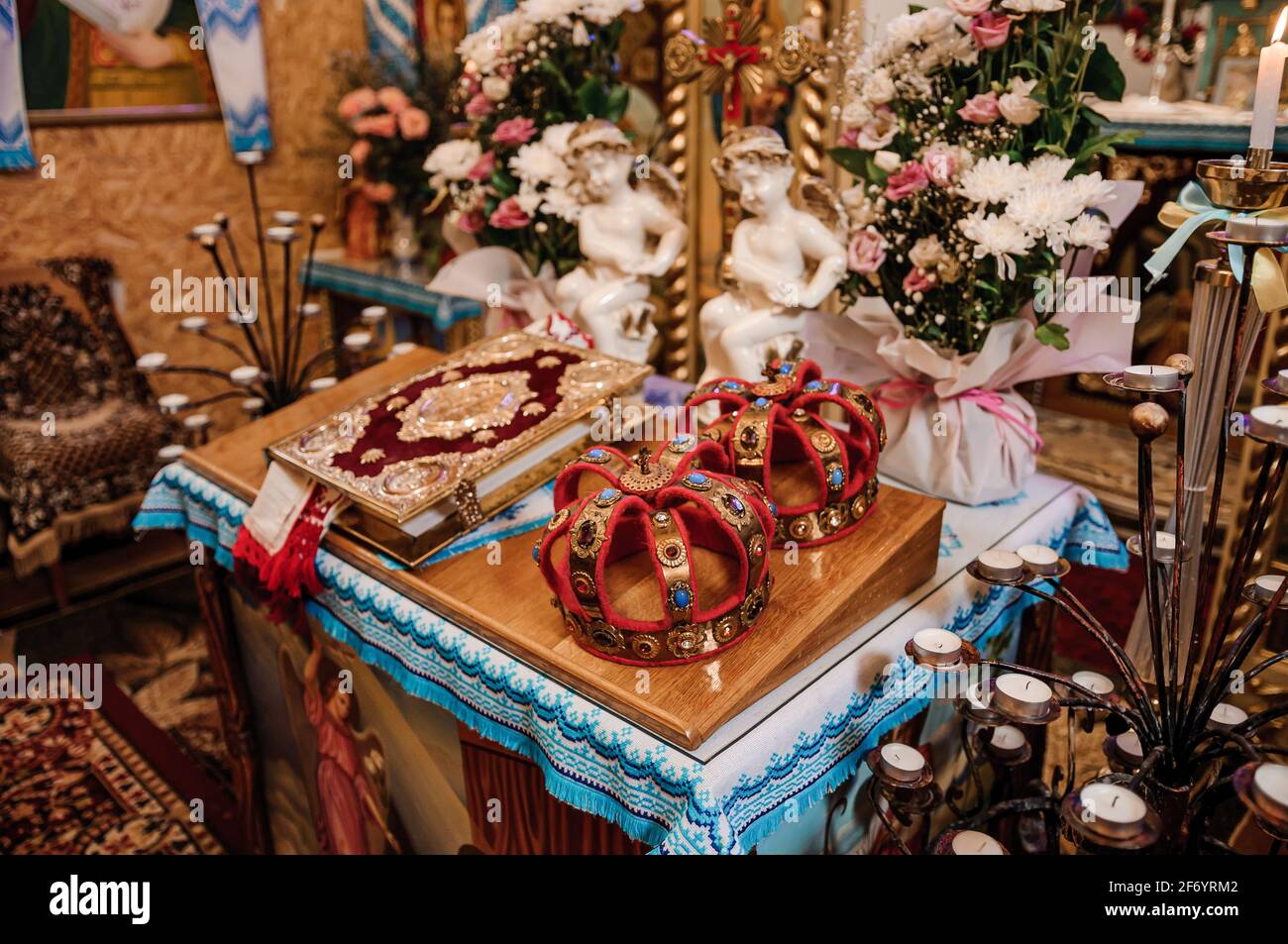 Traditional wedding crowns in a church. Wedding crown in church ready ...