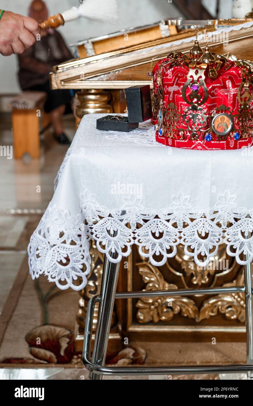 Traditional wedding crowns in a church. Wedding crown in church ready ...