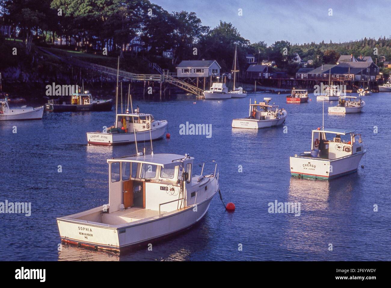 Boats moored in New Harbor, Maine Stock Photo