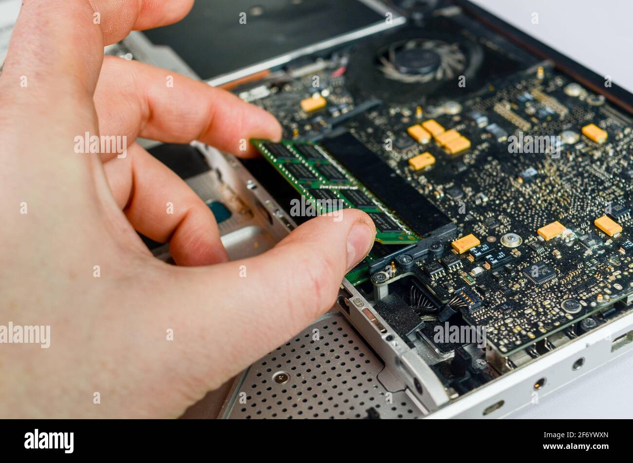changing vintage macbook pro ram Stock Photo