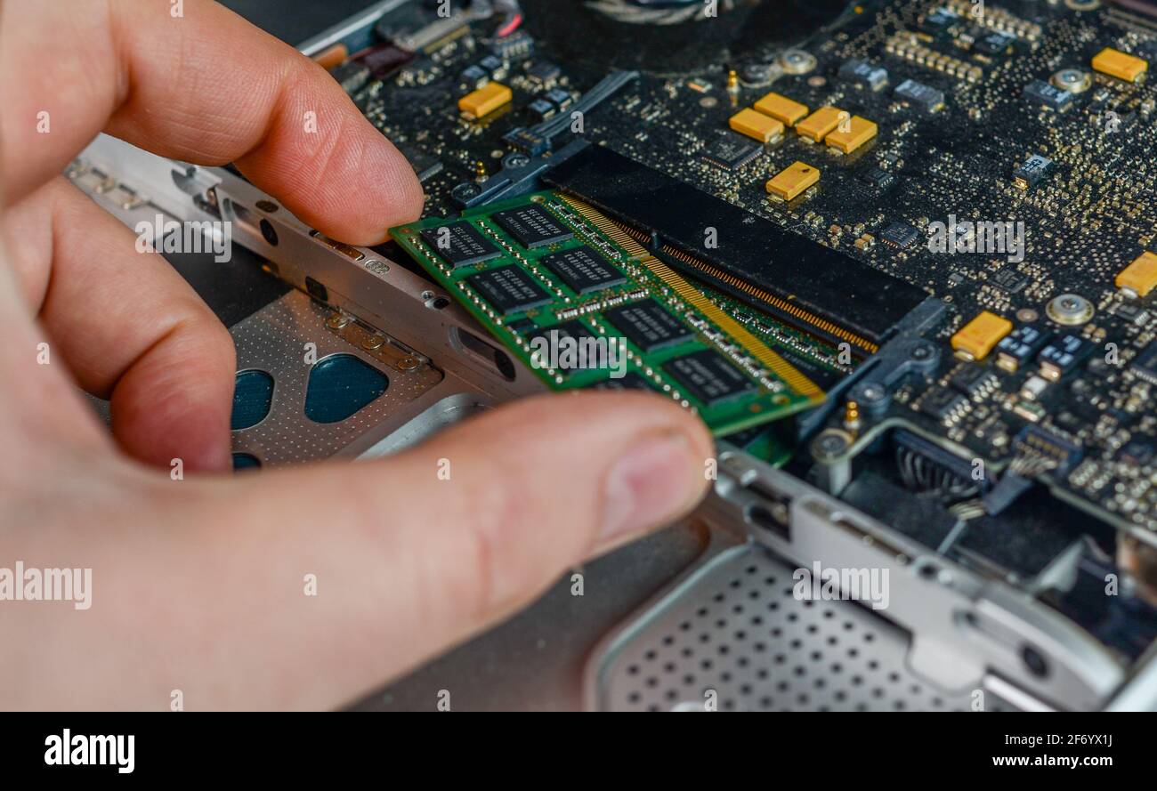changing vintage macbook pro ram Stock Photo