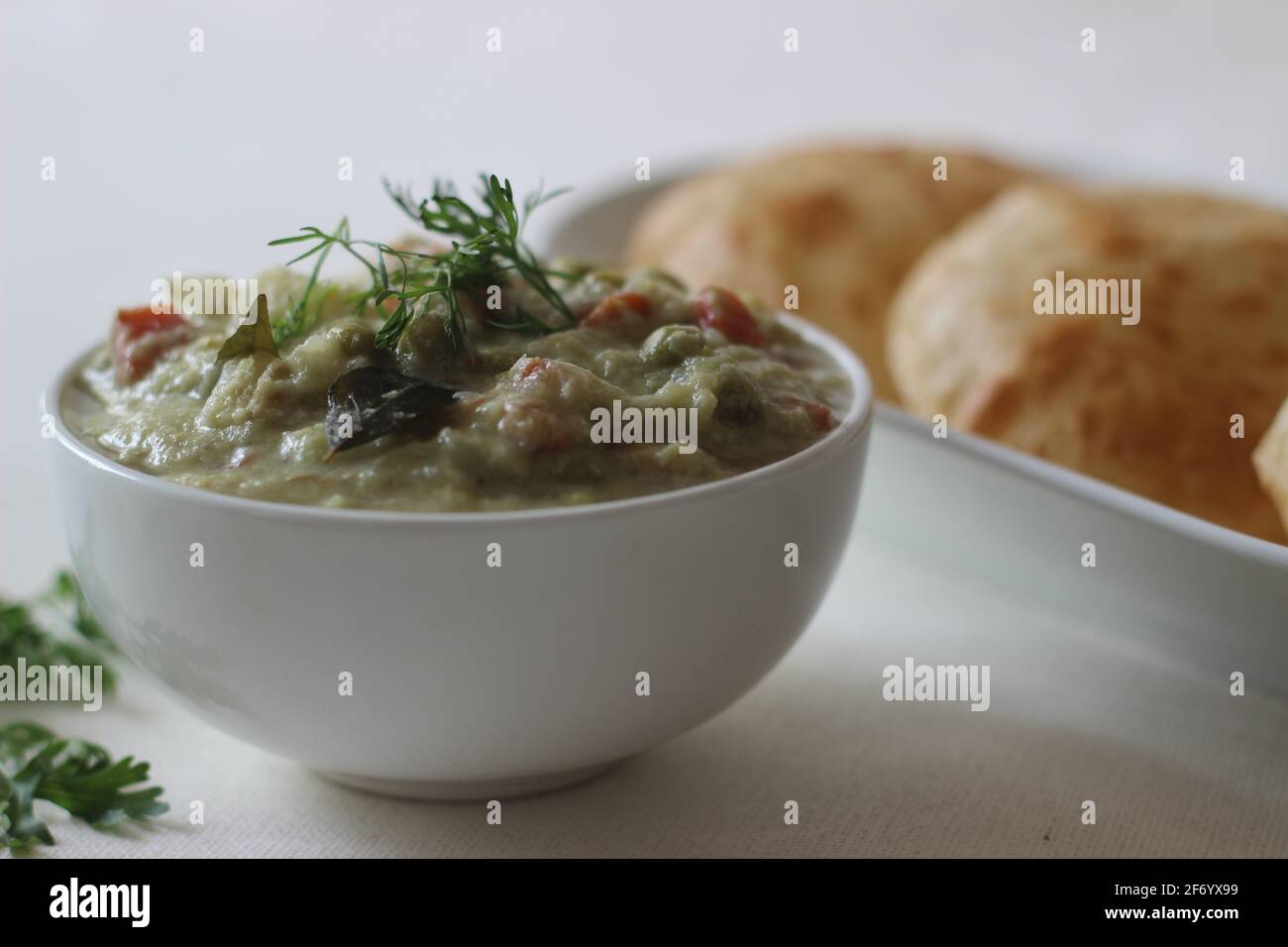 Mixed vegetable curry in a coconut cashew gravy served with deep fried