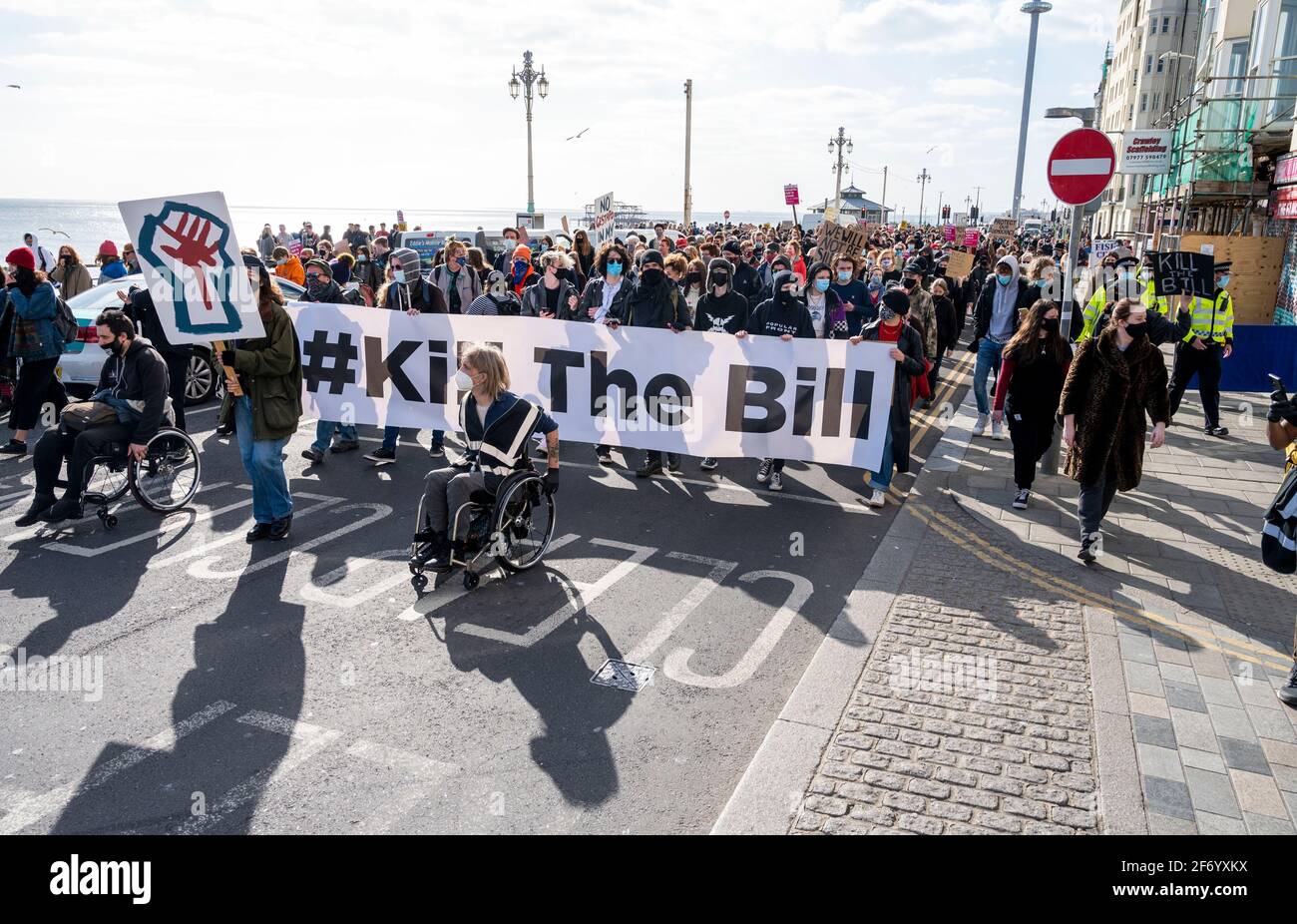 Brighton UK 3rd April 2021 - Hundreds of 'Kill The Bill' protesters march through Brighton in protest against the governments controversial new bill which would give police powers to crack down on peaceful protest  :  Credit Simon Dack / Alamy Live News Stock Photo