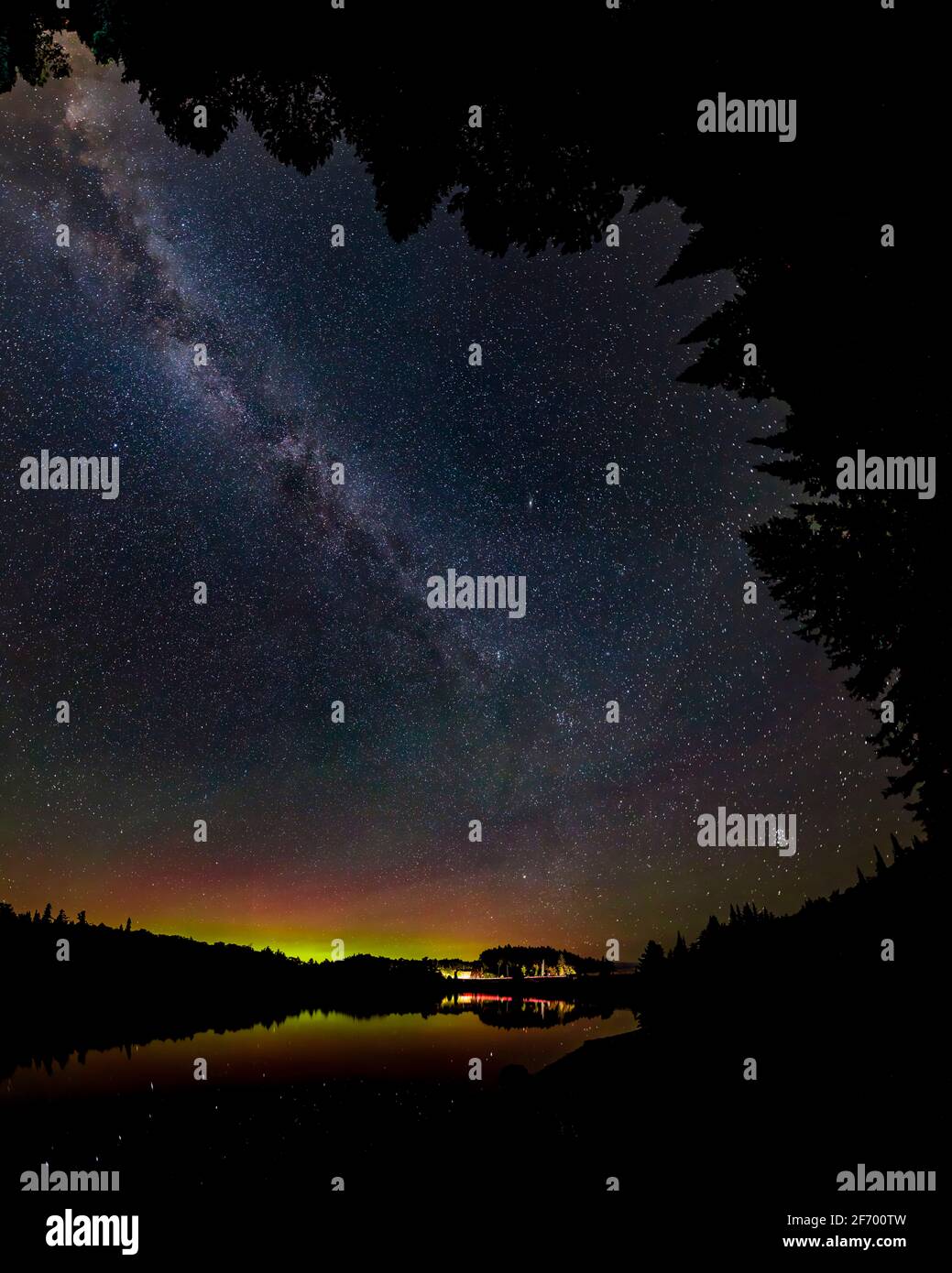 A dramatic wide angle of the Milky Way Galaxy and the Northern Lights ...