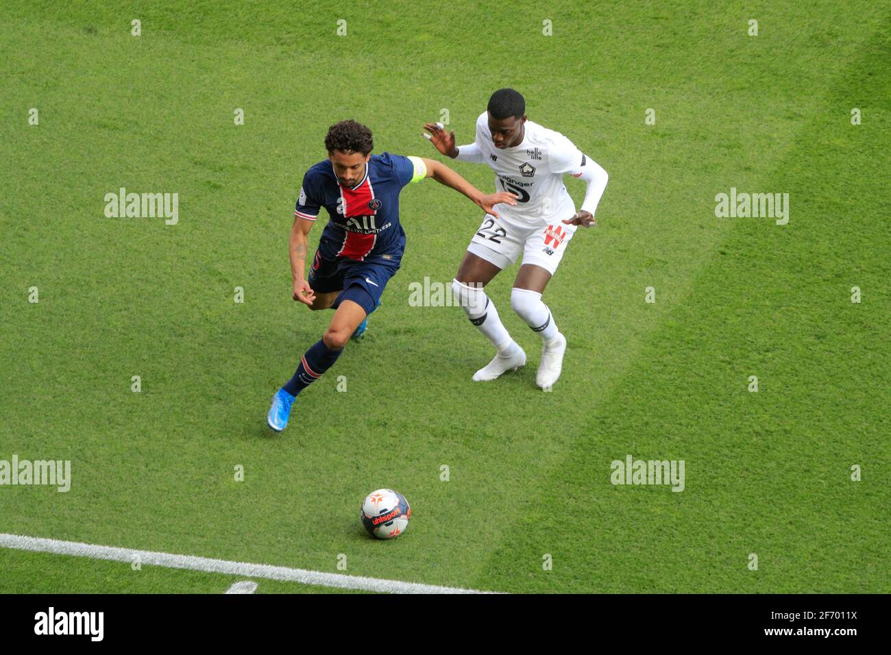 Marcos Aoas Correa, Marquinhos (PSG) and Timothy WEAH (Lille OSC) battled for the ball during the French championship Ligue 1 football match between Paris Saint-Germain and LOSC Lille on April 3, 2021