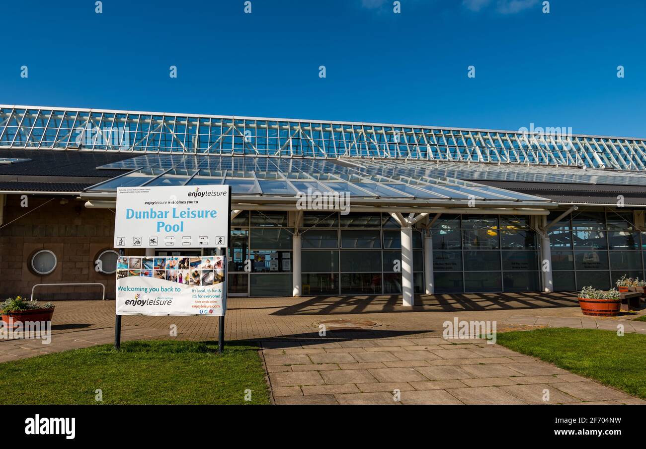 Entrance of Dunbar Leisure Centre indoor swimming pool on sunny day with blue sky, East Lothian, Scotland, UK Stock Photo