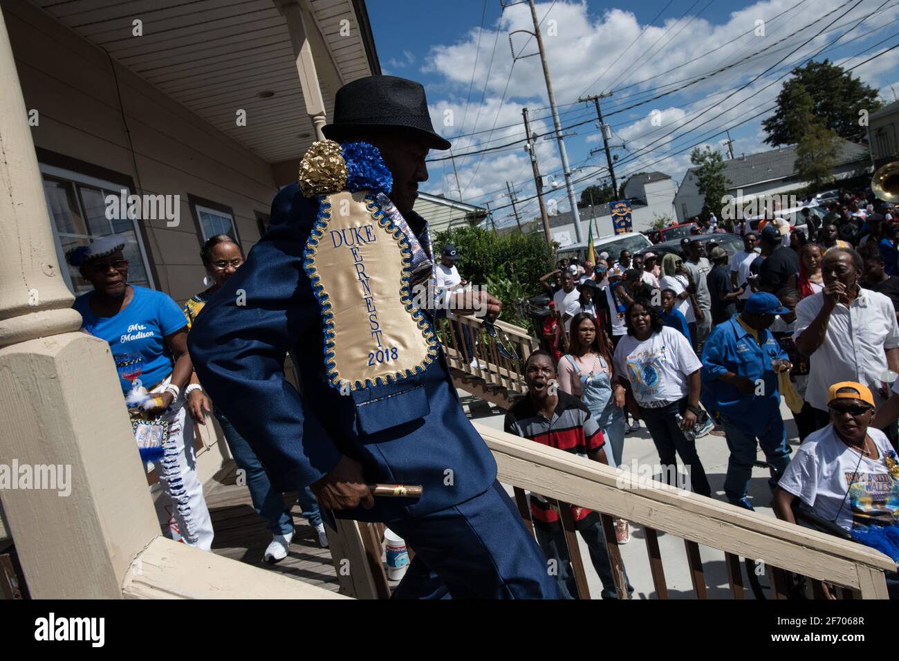 Young Men Olympians, New Orleans Social Aid and Pleasure Club Second Line (Secondline) Parade dancers on Second Line Sunday. New Orleans, Louisiana. Stock Photo