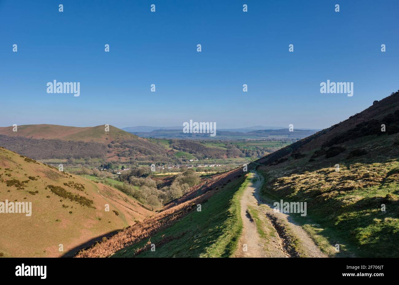 The path along Small Batch, looking towards Ragleth Hill and Little Stretton, on the Long Mynd, Church Stretton, Shropshire. Stock Photo