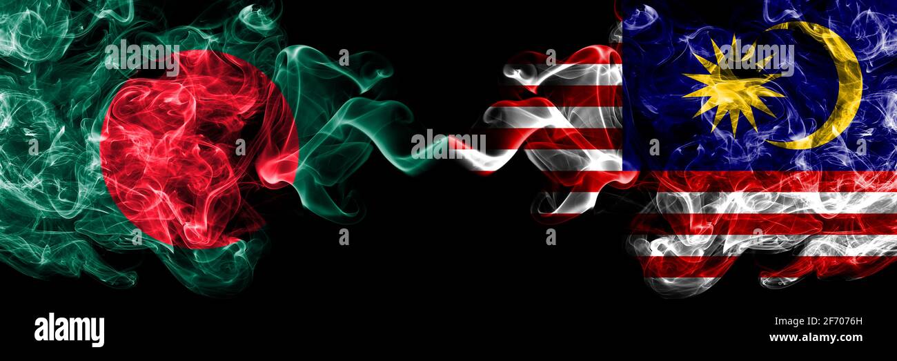 Bangladesh Bangladeshi Vs Malaysia Malaysian Smoky Mystic Flags Placed Side By Side Thick Colored Silky Abstract Smokes Flags Stock Photo Alamy