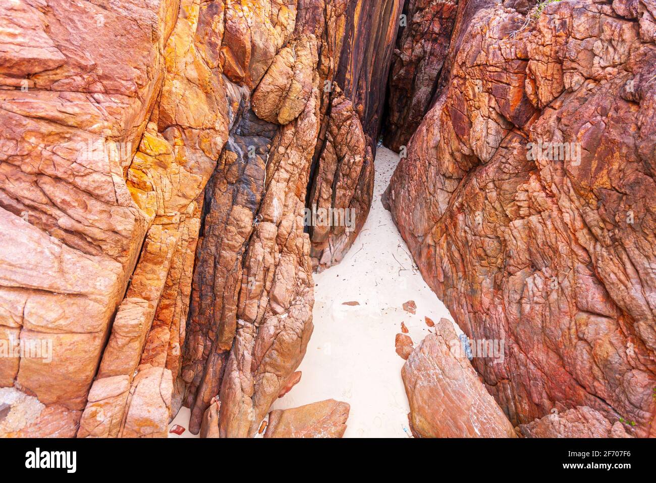 Texture of red rocks on Redang Island, Malaysia Stock Photo
