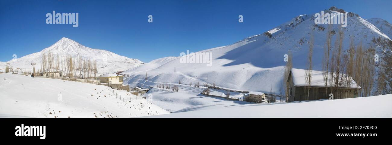 Mount Damavand in Iran next to a small village Stock Photo