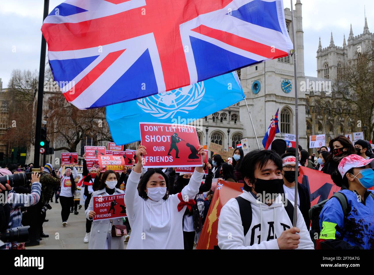 LONDON - 3RD APRIL 2021: Protesters on Parliament Square against the Chinese and Russian supported military coup in Myanmar Burma. Stock Photo