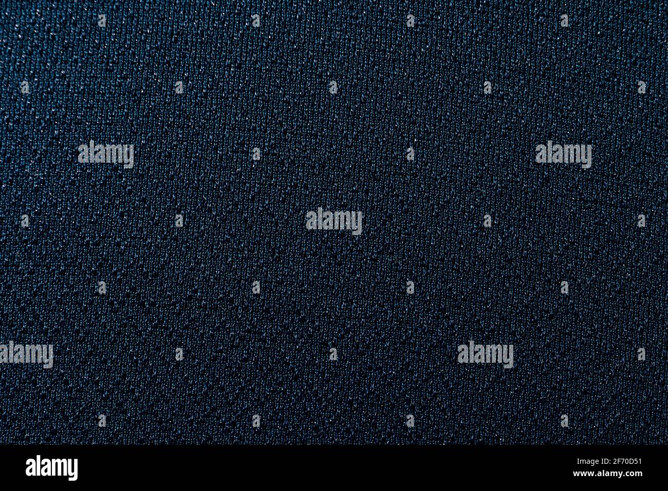 Polyester fabric background high-resolution texture in dark blue or teal Stock Photo