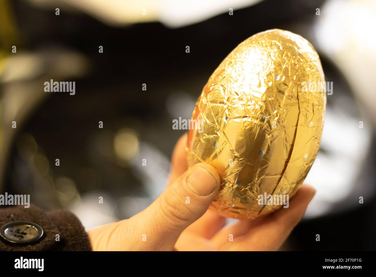 A large golden chocolate egg Stock Photo