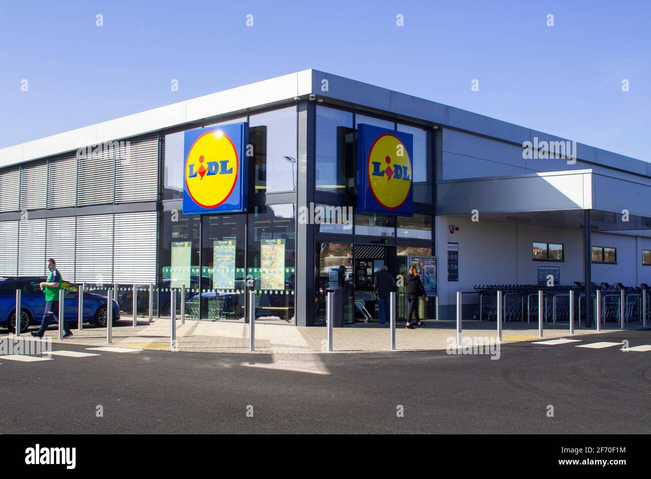 3 April 2021 Customers entering the brand new Lidl discount super store in Castlebawn Retail park in newtownards, County Down on opening day Stock Photo