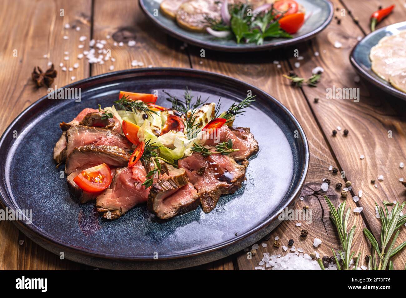 Beef tenderloin fried on fire with herbs, seasoned with spices