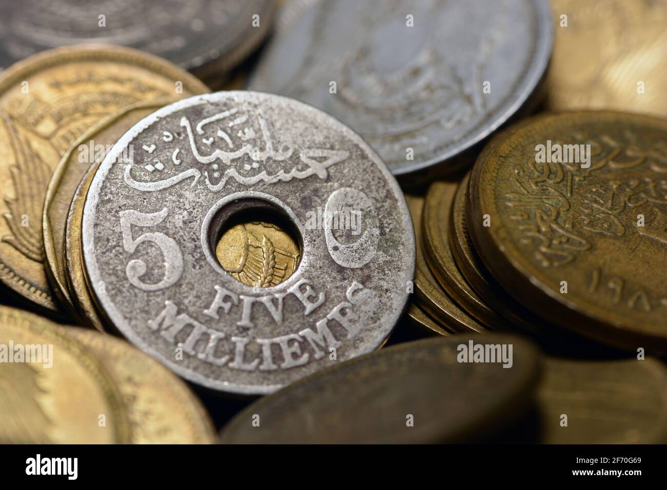 five milliemes coin 1917, old Egyptian money of 5 milliemes coin the currency of kingdom of Egypt at the time of Sultan Hussein Kamel of Egypt. Stock Photo