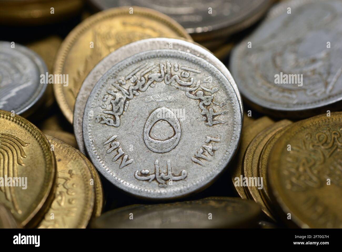 five milliemes coin 1967, old Egyptian money of 5 milliemes coin the currency of the United Arab Republic of Egypt and Syria, Vintage retro Stock Photo